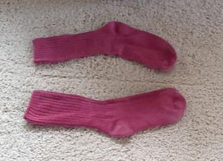 No, a sock and its mirror image have the same foot fittedness. Socks Which is chiral?