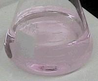 phenolphthalei n turns from clear to pink.