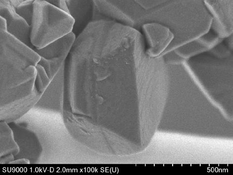 7 Low-accelerating-voltage SEM observations of commercially available Y-zeolite Steps can clearly be observed on the surface, reflecting the crystal structure.