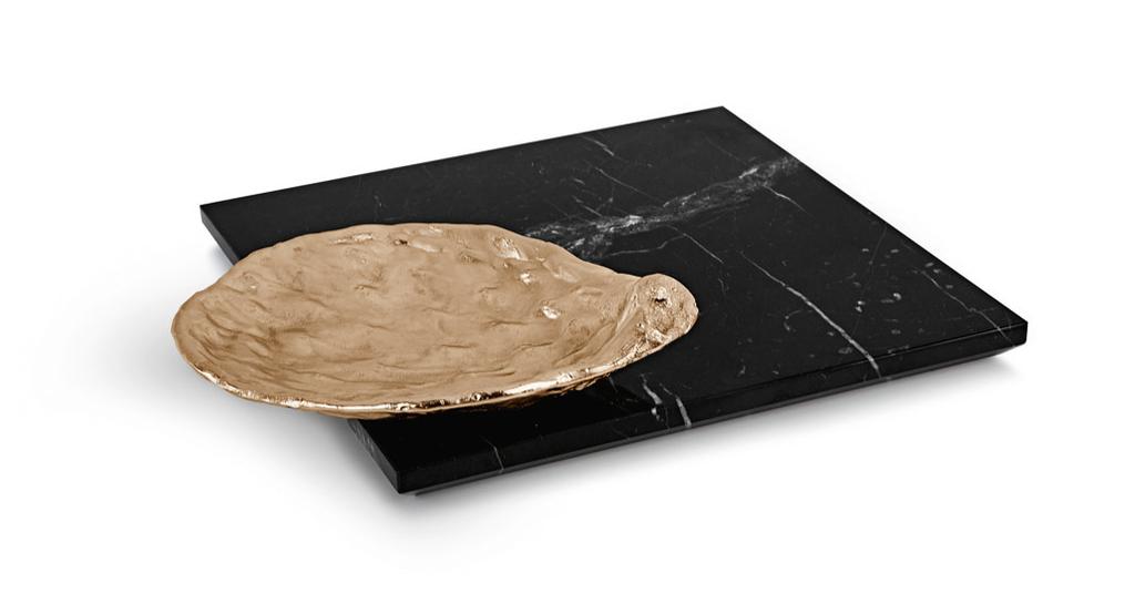 Cratera Tray The Cratera tray presents a striking resemblance to the complex texture and craters of the moon s surface, formed over millennia of atmospheric impacts.