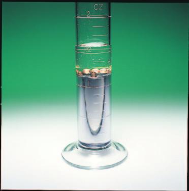 Figure 2.7 Relative Densities Density is the ratio of mass to volume. Both water and copper shot float on mercury because they are less dense than mercury.