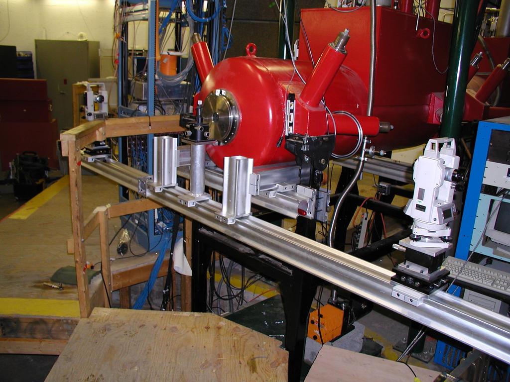 To facilitate the above movements, we have mounted the two theodolites on a large aluminum extrusion (Newport X-95 rail) 6.