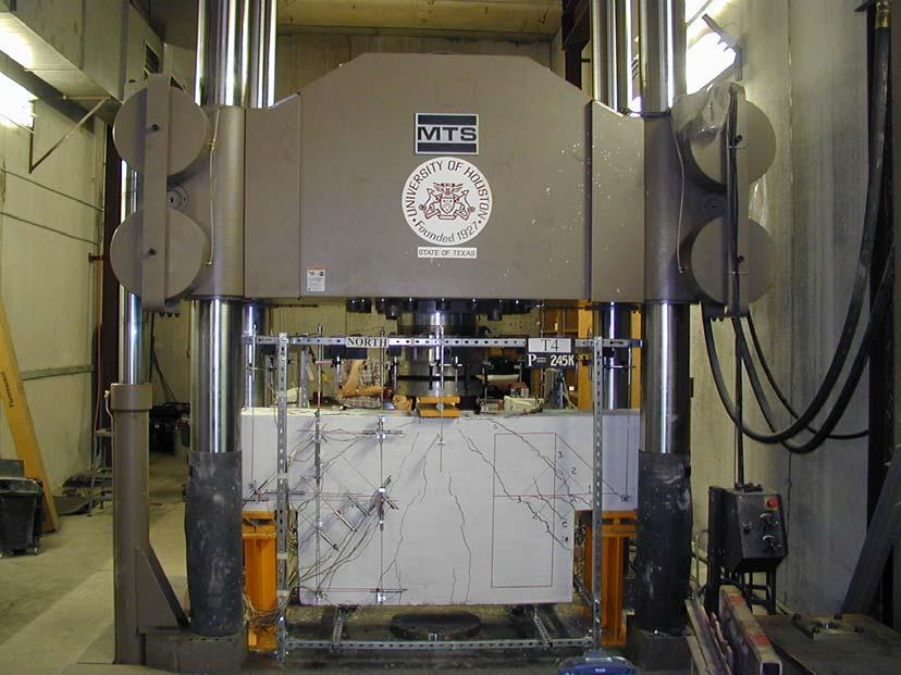 All specimens were tested in the 2.5-million lbs MTS testing system as shown in Fig. 2.3.