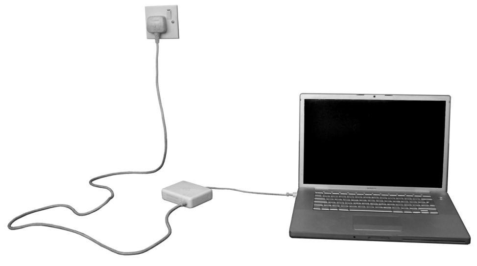 17. A laptop is plugged into the mains to charge. A blue LED flashes to indicate that the laptop is charging. The LED is connected to a pulse generator.