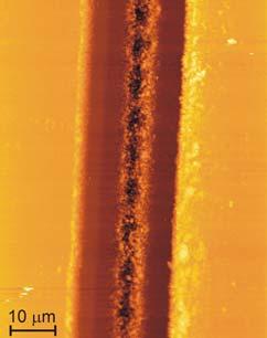 The laser fluence averaged through beam diameter is shown on the right side. Selected samples with trenches of the most acceptable shape and quality were tested by SEM.