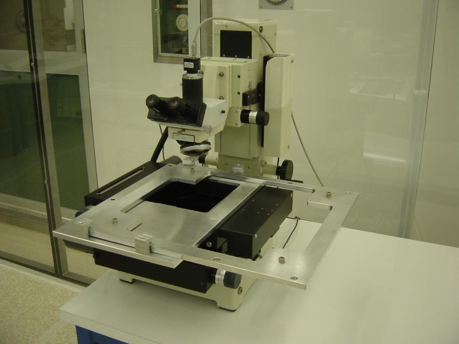 An automated microscope will scan through the grid taking digital focus