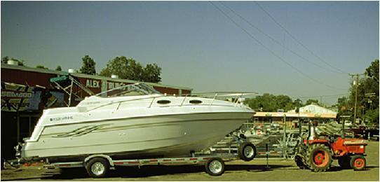 APPLICATIONS The boat and trailer undergo rectilinear motion.