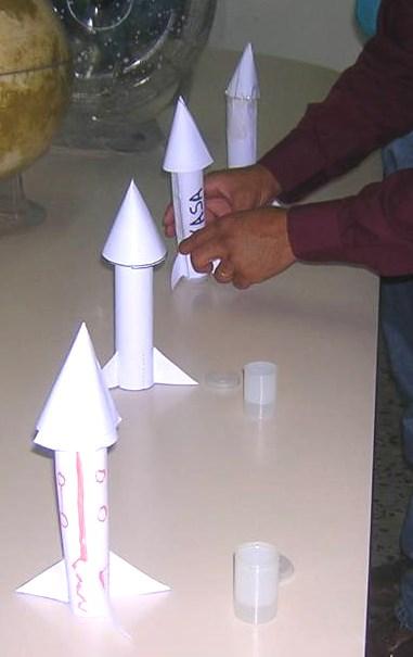 Fig. 17: Some rockets. Fig. 18: Simplified scheme Fig. 19b: Model for the three fins. Fig. 19c: Top cone of the rocket.