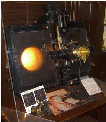 (1906-1997) At Lowell Observatory with this telescope