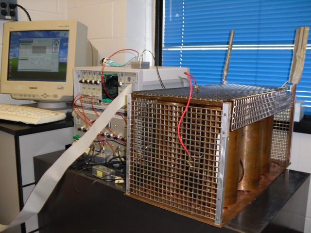 Alpha Beta Counting System Transparent liquid scintillator vials optically coupled to 2'' PMTs.