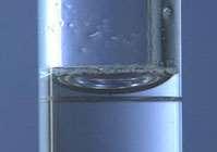 - A characteristic of liquids in glass containers is that they curve at the edges. - This curvature is called the meniscus.