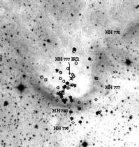 61 Figure 20. Members of the young cluster born in IC 1396N, overplotted on the DSS red image of the globule.