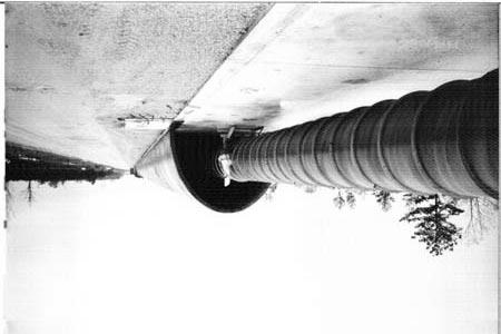 '#/7$' LIGO beam tube under construction in January 1998 65 ft