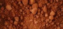 Dry & reddish (rusty) Range of pisolite/nodule sizes High Gibbsite, low Boehmite 0-7 % Boehmite Moist &