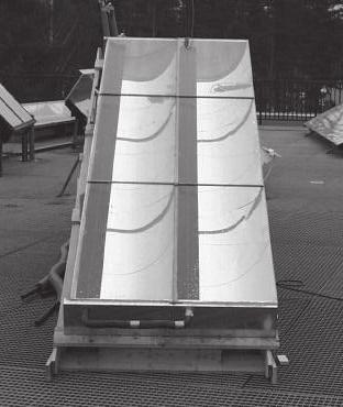 Optical characterization of solar collectors from outdoor measurements Figure 3.13 A photo of the west side of an East/West-MaReCo with a collector tilt of 25. (North is to the left in the figure.
