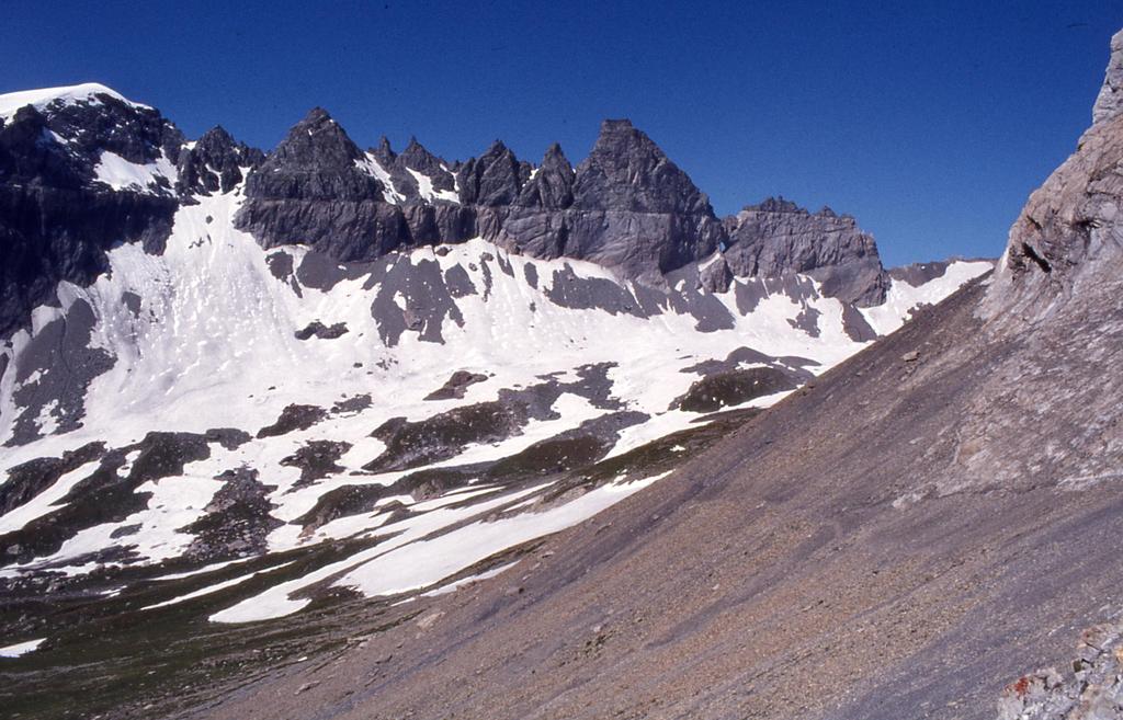 Glarner Thrust (Swiss Alps) Geologic domains, such as the Canadian Rocky Mountains, and the Swiss Alps are produced by regional tectonic shortening and thickening of the