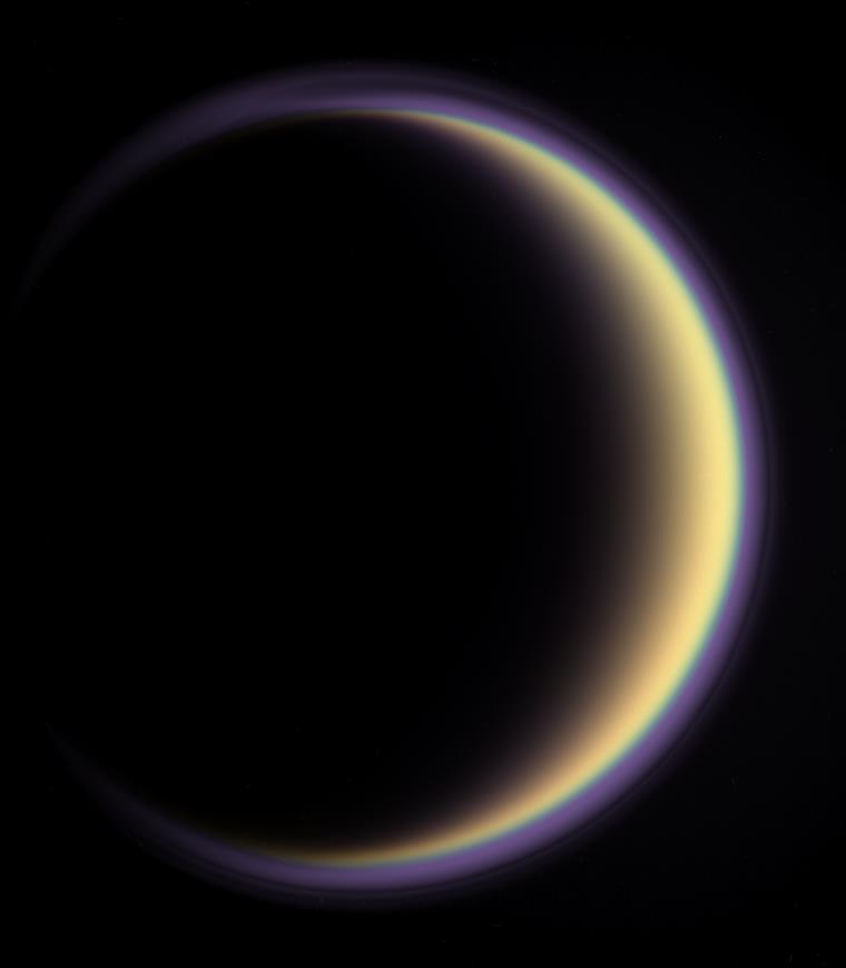 Titan has a Dense Atmosphere Titan s dense atmosphere is mostly nitrogen and methane.