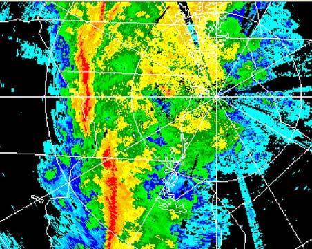 ) The inbound velocities associated with the convergence to the rear of the linear segment are coincident with a channel of minimum reflectivity, suggesting a subsident component to the flow.