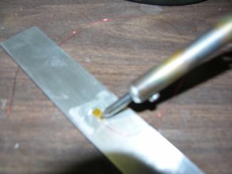Materials: Strain Gauge, FAR-1: M-Flux Figure 55: Soldering step 1 Step 2: Apply a solder bead to strain gauge Gather some
