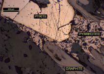 thin section petrography can help define areas or specific lithologies where sulphides may be absent, present as