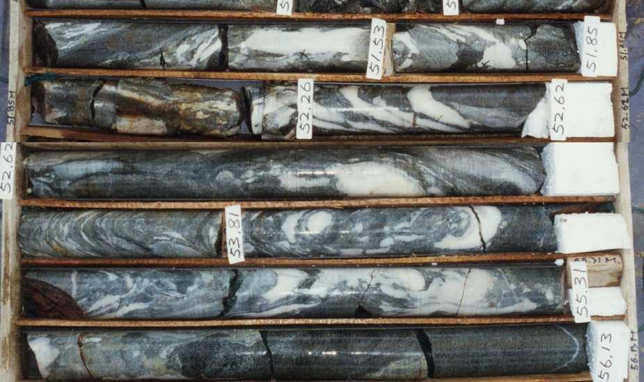 Tuffaceous Marble Breccia Step 1: Pyroclastic component? (Yes, 25-75%) Rock Name: Tuffaceous Breccia(angular cobbles dominant) Step 2: Marble clast component?