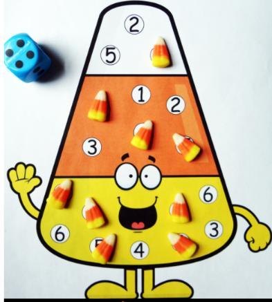 Cilji: 6. Didaktična igra: Sladka koruza - Učenci štejejo do 6 (ali do 12). - Učenci povežejo število pik na kocki z zapisom številke.