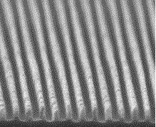 Wire grid polarizer in the visible Using semiconductor fabrication techniques, a