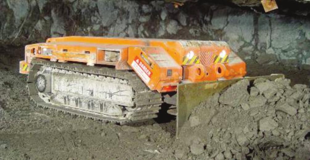A later section of this report describes the breast mining layout used at Hossy shaft in greater detail. XLP bolter The XLP bolter (Figure 3) utilizes a single boom to drill and install 1.