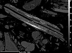titano-magnetite, biotite and ilmenite - ferrihydrite in isolated spots