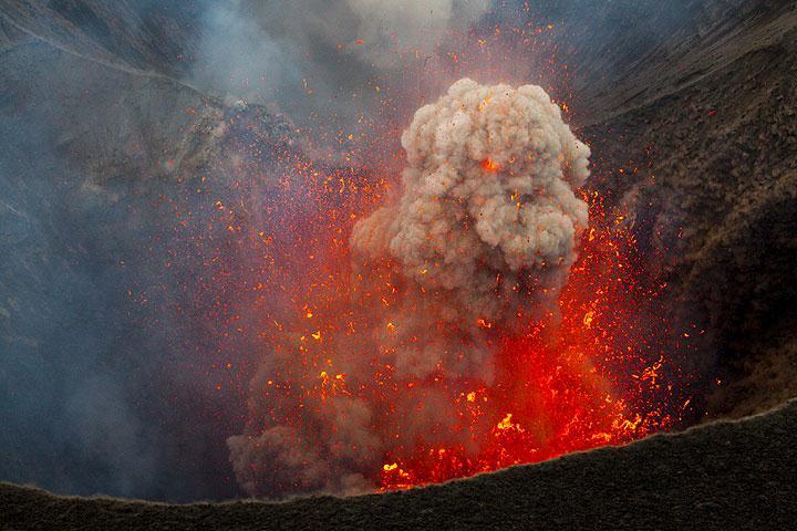 Strato volcanoes, also called composite volcanoes, erupt with molten lava, solid rock, and ash.