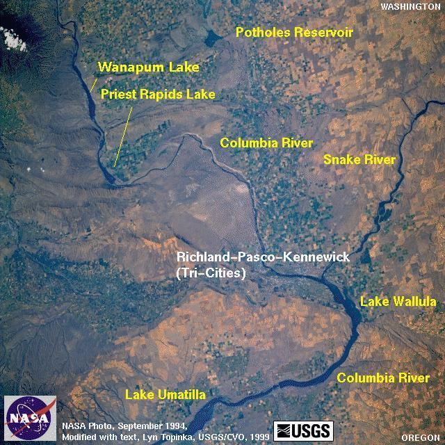 COLUMBIA RIVER BASIN Underlying the 100,000 square miles (259 000 square kilometers) of the Columbia Basin are deposits of lava (mainly basalt) interbedded with sedimentary rock nearly 10,000 feet