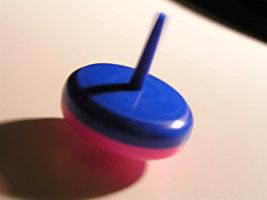 Spinning top A rotating body with a big moment of inertia is called a spinning top A