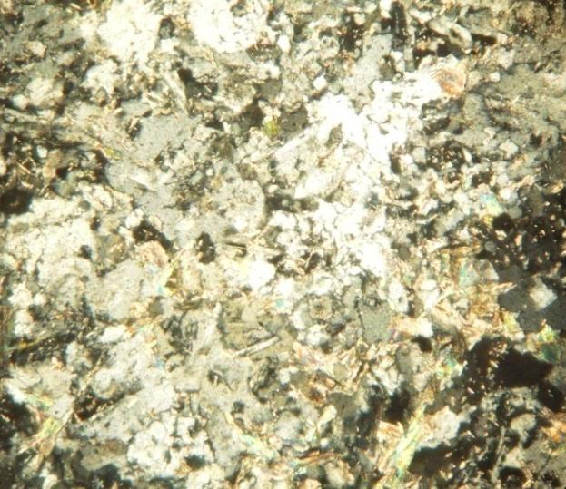 and quartz (Q) and minor alkali feldspar (F).