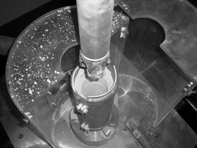 3: Frank Jr. photos: a) Roller-cone bit; b) Set up before drilling test.