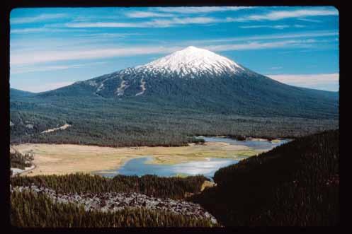 Activity 38 COMPARING VOLCANIC MOUNTAINS a. Shield volcanoes, such as Oregon s Mount Bachelor, shown here, usually form large, broad volcanoes.