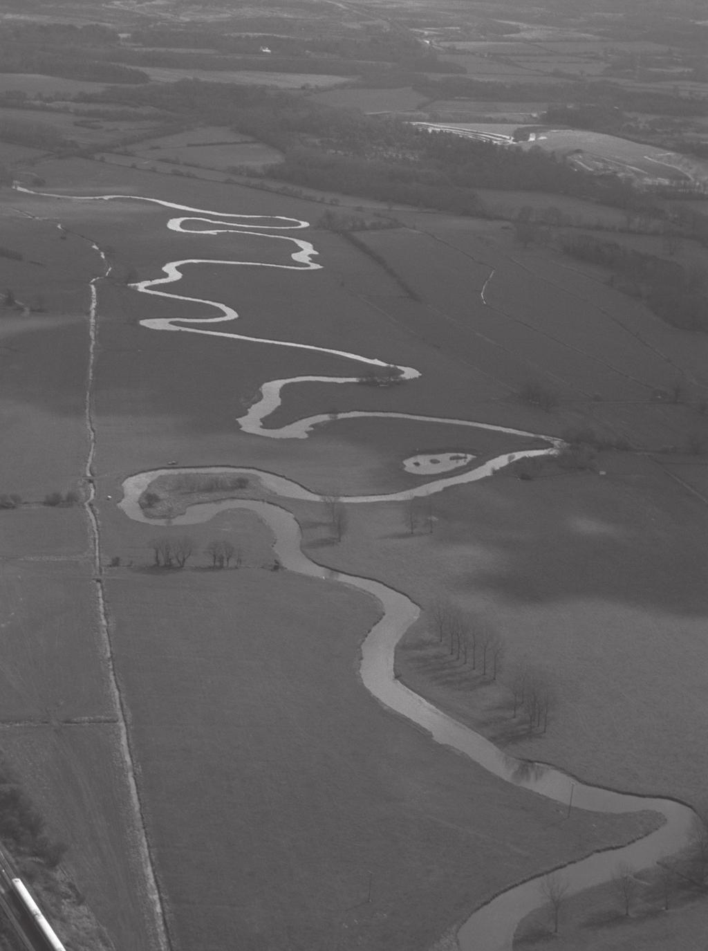 19 5 (b) (i) Study Figure 10 on the insert, a photograph of the River Tees in its middle course. Figure 11 is a black and white copy of Figure 10.