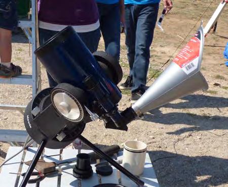 SOLAR PROJECTION WITH OIL FUNNEL By Corinne Shaw Rick Alling, a professor at ASU, made an interesting sun projection attachment for his telescope for the eclipse.
