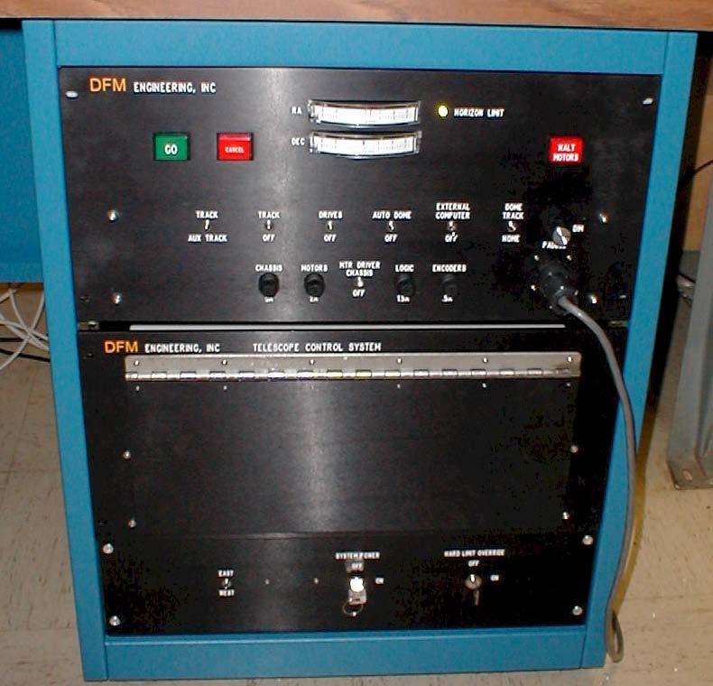 Initial switch settings: In U-D-U-U-D-U U U-off-off Figure 2: the Telescope Control System (TCS) front panel, and the settings that the switches should have before the system power is turned on.