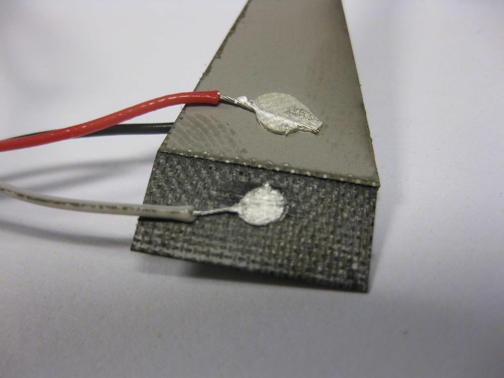 Figure 3.8: Wires connected to actuator. 3.2.2 Construction Using Uncured Carbon Fiber (Method 2). 1.