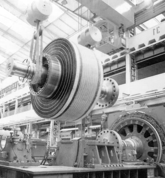 Tutorial 13 (EMD) Large rolling-mill motor In a steel factory in Linz/Austria a large, separately excited, variable speed dc motor is used to drive the 2,7 m long roll stand via a gearbox.