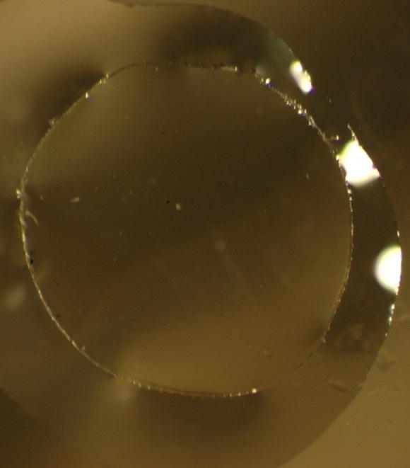 Figure 118 Micrograph of capsular button cut with 3 m lateral and 35 m axial spacing. Throughout this experiment, various leading edge technologies and procedures were included.