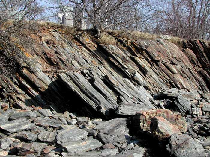 Photo by Rock Structure From a distance (Figure 6), the strongly layered structure of the rock makes it clear that this is not granite.