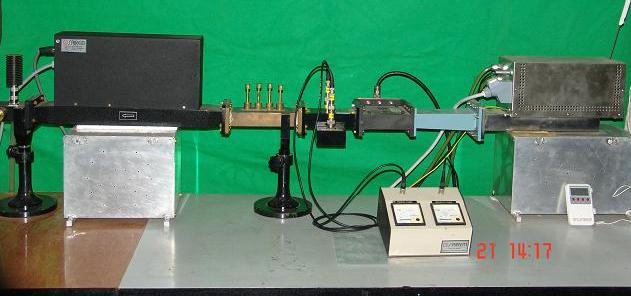 The magnetron was tested up to full power level of 2 kw on a dummy load on a test bench as shown in Figure 4.1 [61]. (a) (b) Figure 4.1 (a) Microwave system on test bench (b) output power calibration.