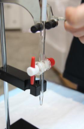 Use the end of the Electrode Holder as a guide for the tip of the burette (Figure 7). DO NOT try and force the burette into the cutout at the end of the electrode holder.