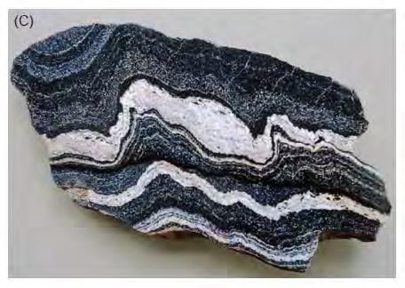 It is either igneous or sedimentary rock that has been
