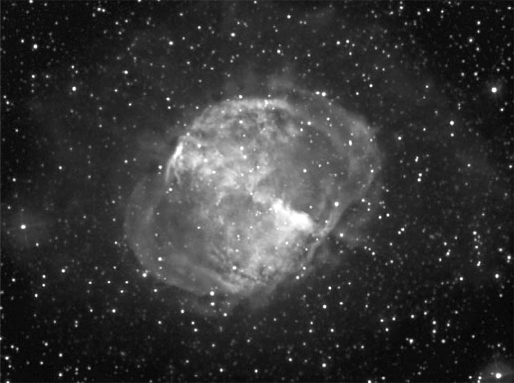 16. The image shows the Dumbell Nebula, a planetary nebula. Image courtesy of NASA (a) Mark with a cross ( ) the type of star that is at the centre of a planetary nebula.