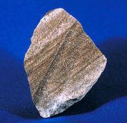 Sandstone Sedimentary rock made of grains of sand cemented and compacted to form a solid rock.