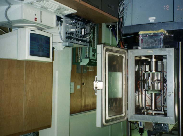 FIGURE 4 Rapid Triaxial Test Apparatus In order to take advantage of inelastic road structure analysis techniques, spatial and temporal load profiles must be accurately quantified as they are applied