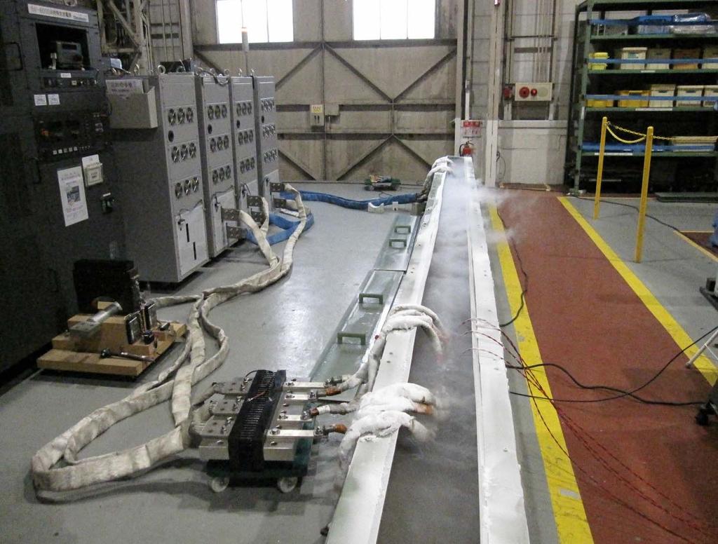 5 m-long Bi-2223 HTS DC cable test setup