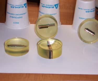 Step V: Polishing the Cross-Sections: After the samples have hardened, they are pushed out of their containers and ready for polishing as seen in Figure 3.